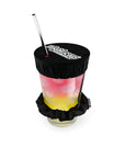Black NightCap reusable drink cover secured over a cocktail with a reusable straw for drink spiking prevention and beverage protection.