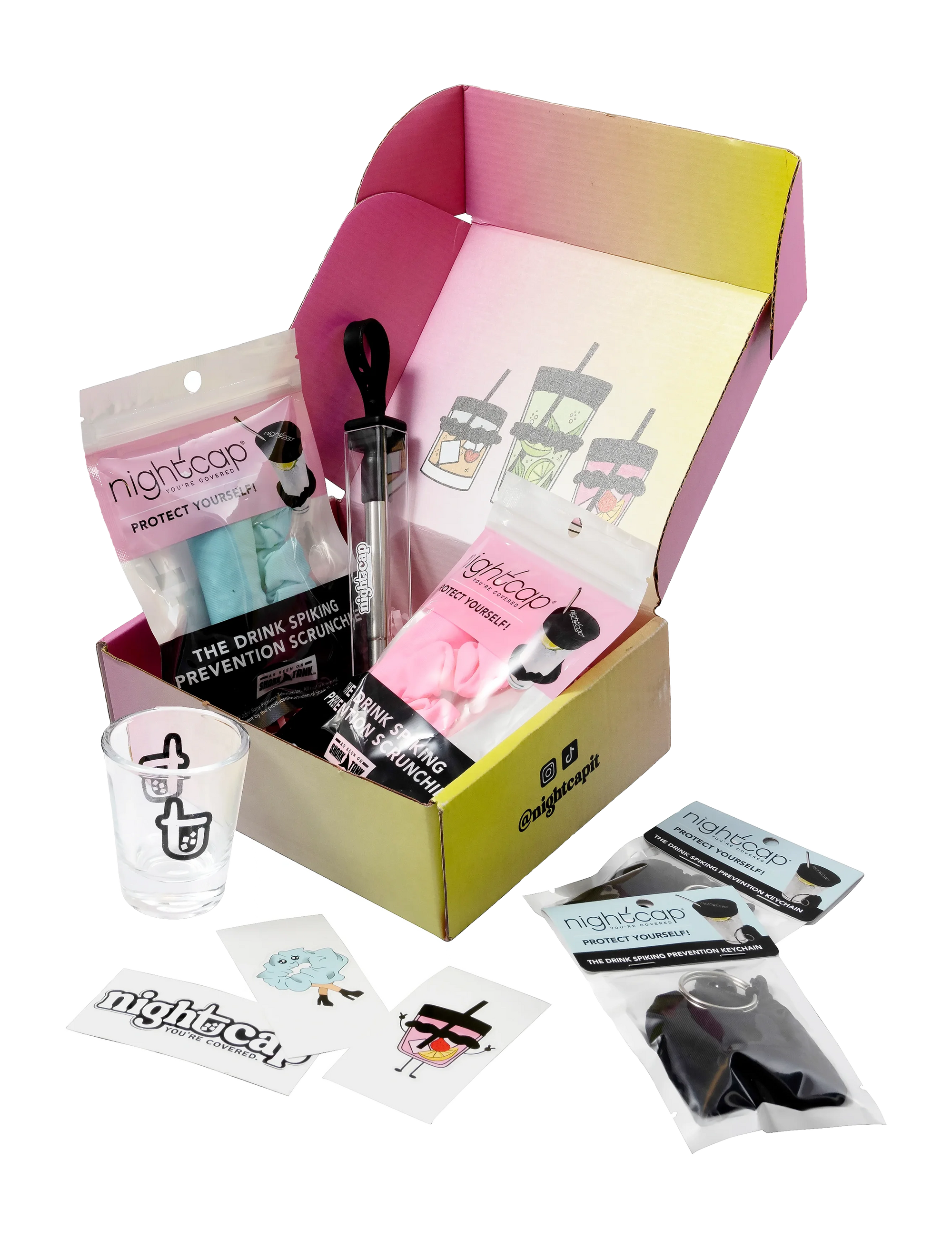 NightCap drink safety gift box featuring drink cover scrunchies, reusable straw, keychain cover, stickers, and branded accessories.