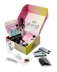 NightCap drink safety gift box featuring drink cover scrunchies, reusable straw, keychain cover, stickers, and branded accessories.